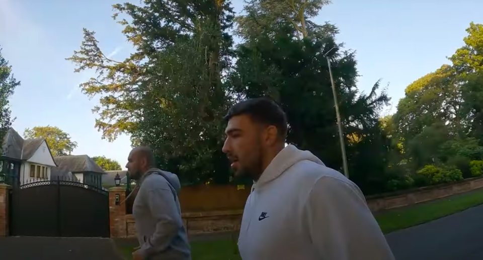 Tommy in his YouTube video on a run with brother Roman