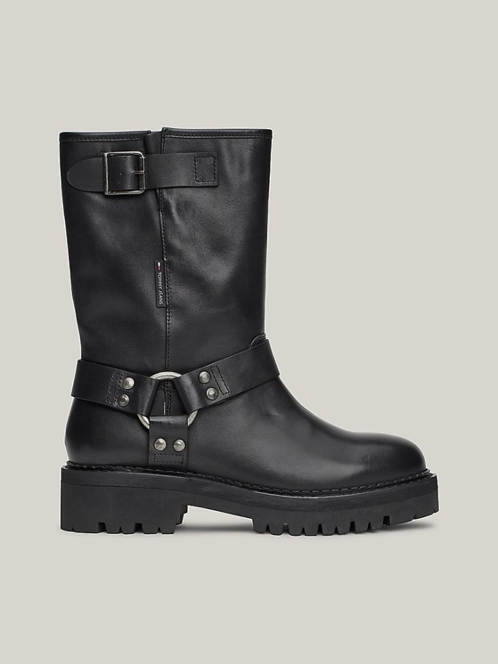 a pair of black boots made by tommy hilfiger