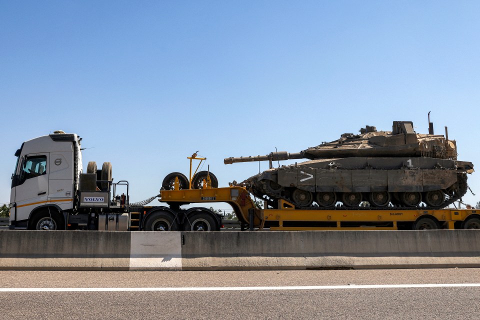 An Israeli tank headed for deployment along the border with Lebanon