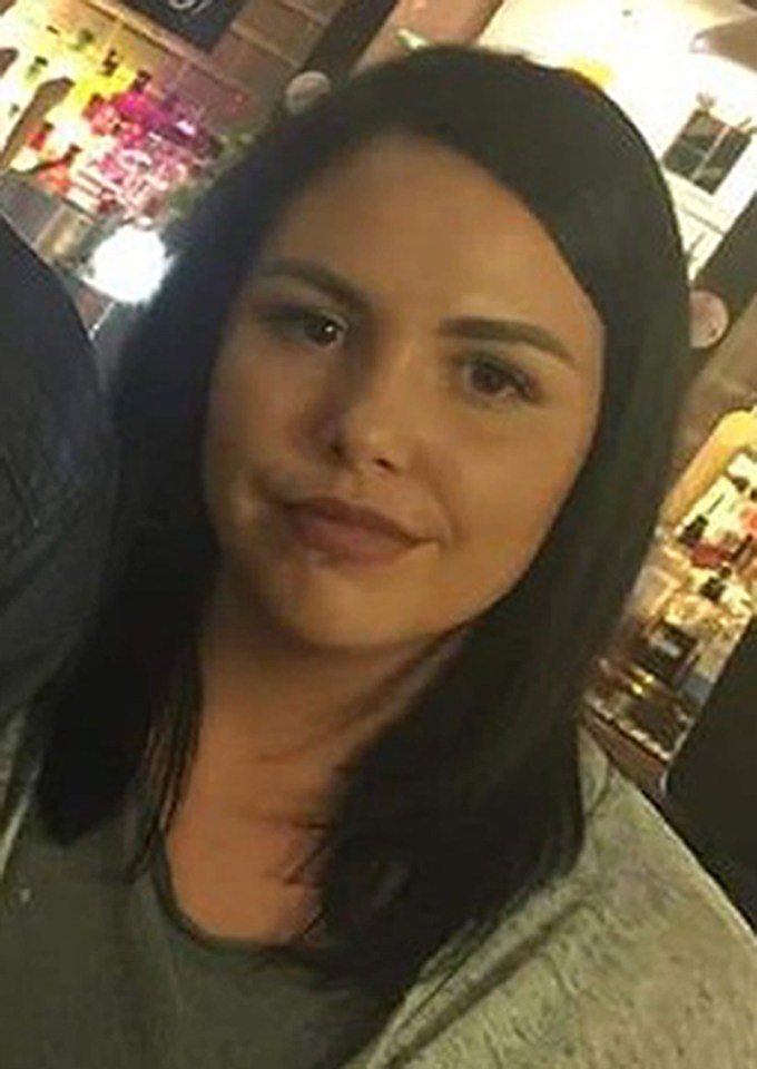 a close up of a woman 's face in a restaurant .