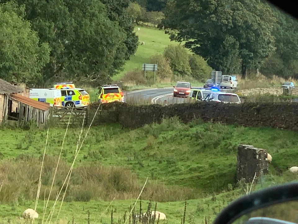 Police at the scene where an eight-year-old boy was shot in the head and face