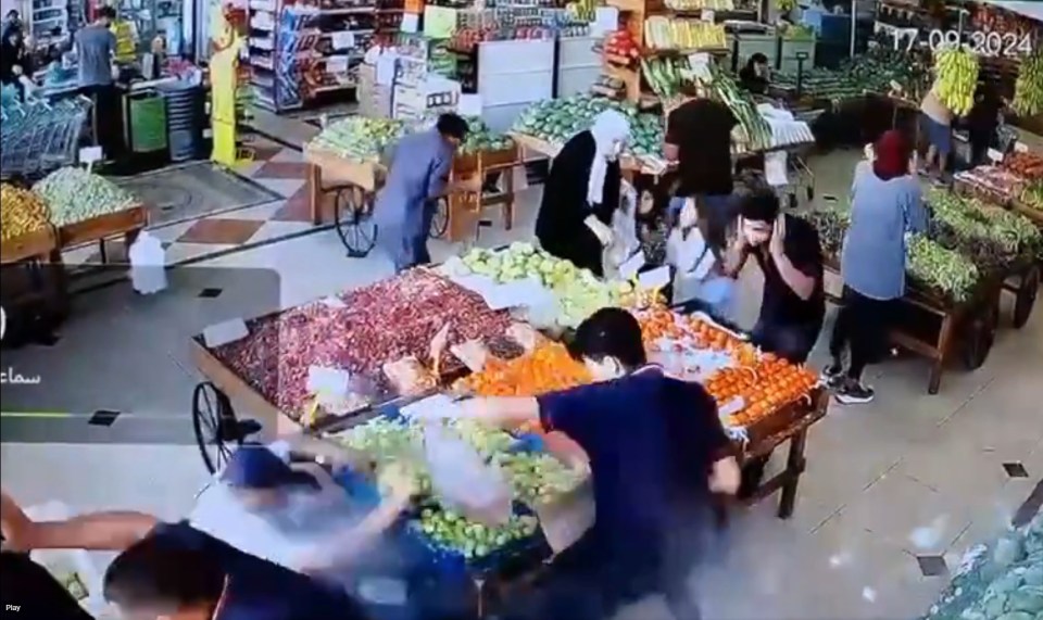 Footage shows shoppers knocked to the ground by the blast