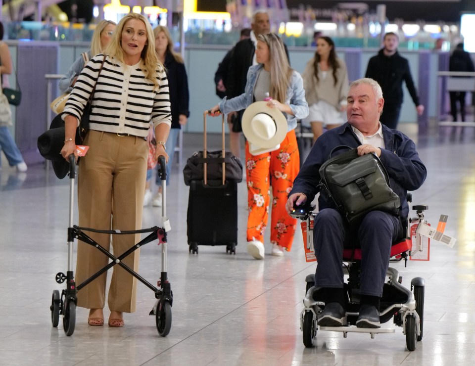 a man in a wheelchair has a bag that says ' priority ' on it