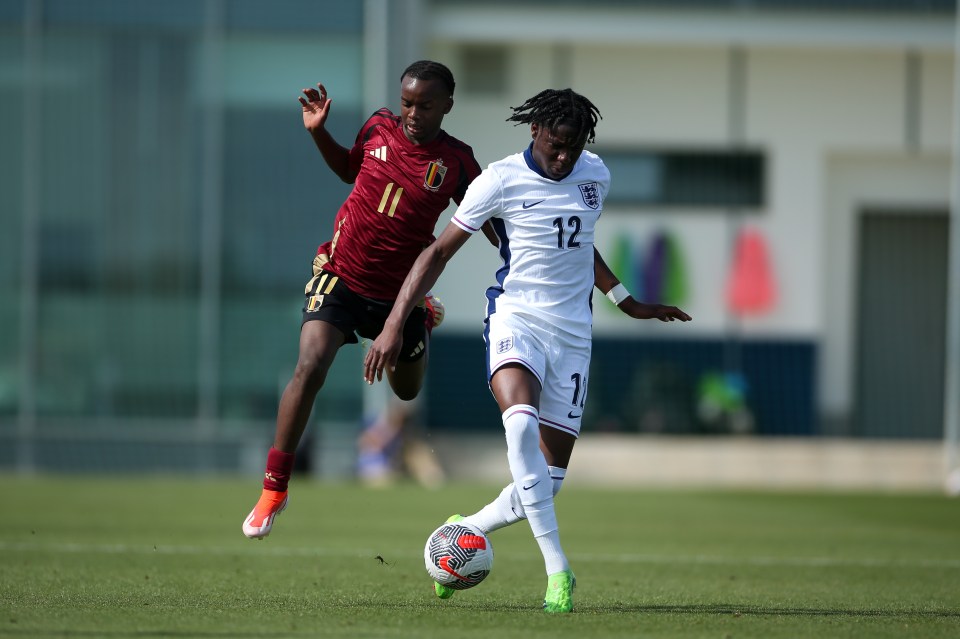 a soccer player with the number 12 on his jersey