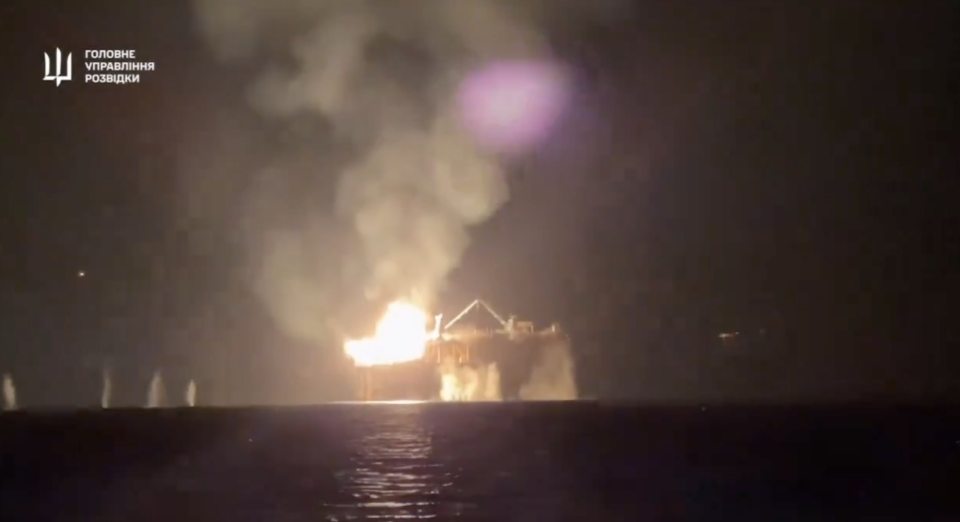 The gas rig on fire seen from the Ukrainian boats