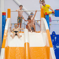 The indoor swimming pool at Searles comes complete with dual slides