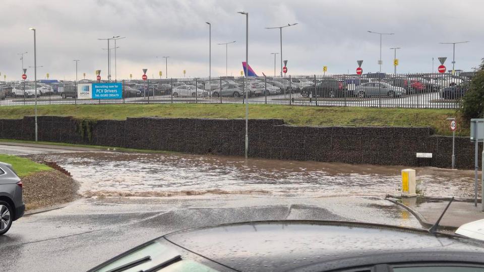 Luton Airport is totally inaccessible due to flooding at its main roundabout