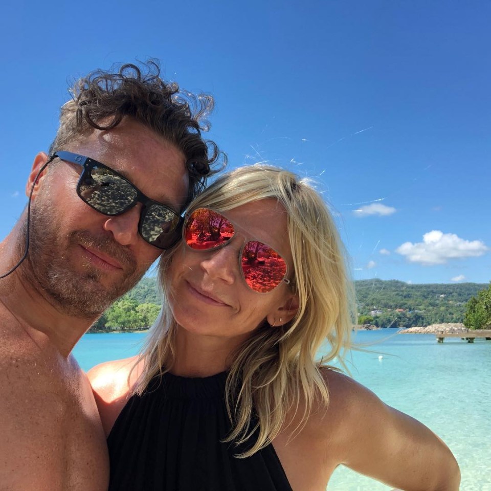 a man and a woman wearing sunglasses are posing for a picture