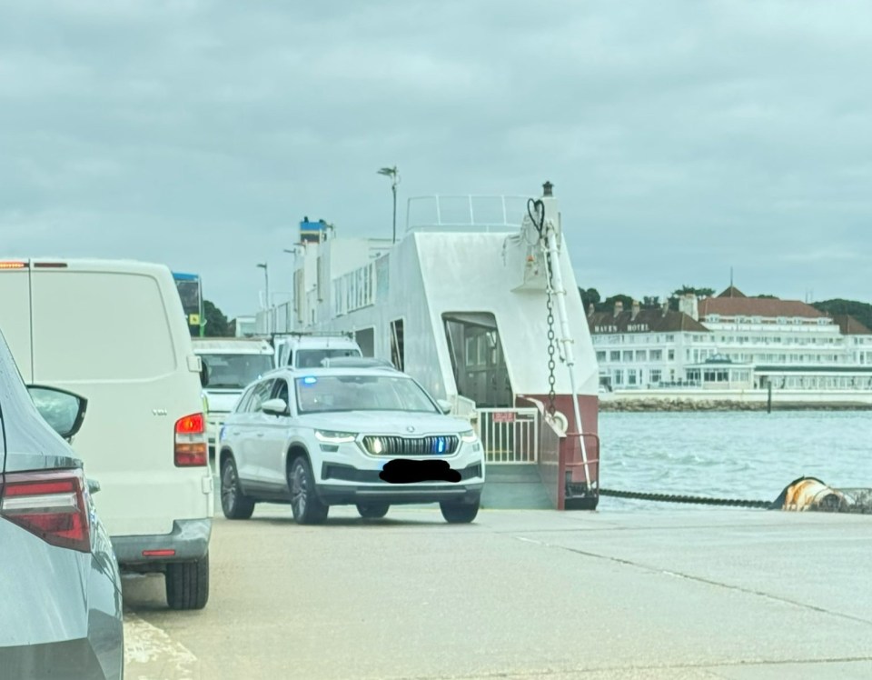 a white car with a license plate that says ' a ' on it