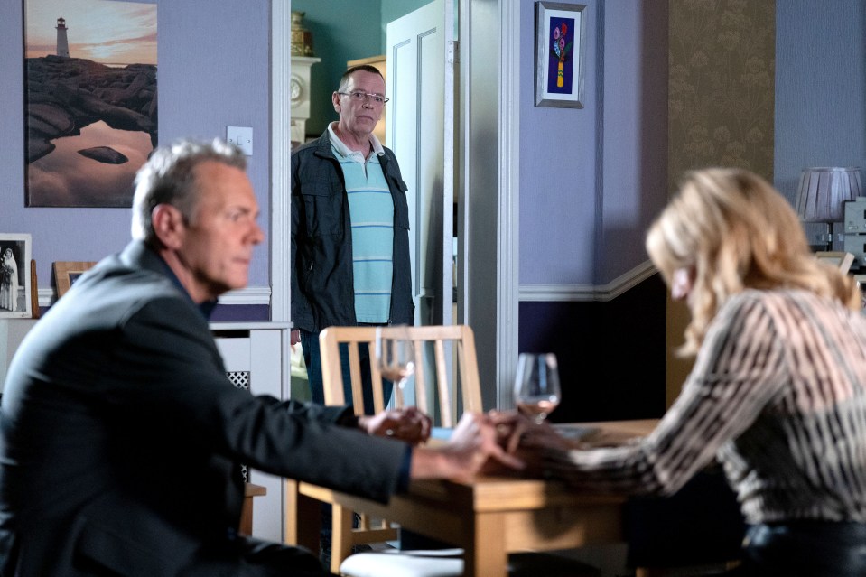 Back to the nineties. David Wicks is back getting close to Cindy Beale as Ian Beale walks in to find them hand in hand.