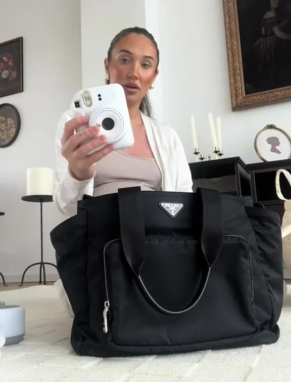 The TOWIE star made sure to pack plenty of outfits and blankets, and a posh Polaroid camera