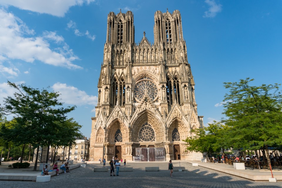 Reims is often called the city of ­Champagne and has an iconic ­towering cathedral