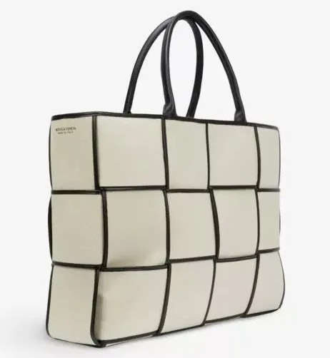 Fashionistas have fallen in love with Bottega Veneta’s Arco large Intrecciato woven tote bag, pictured, which costs £2,240