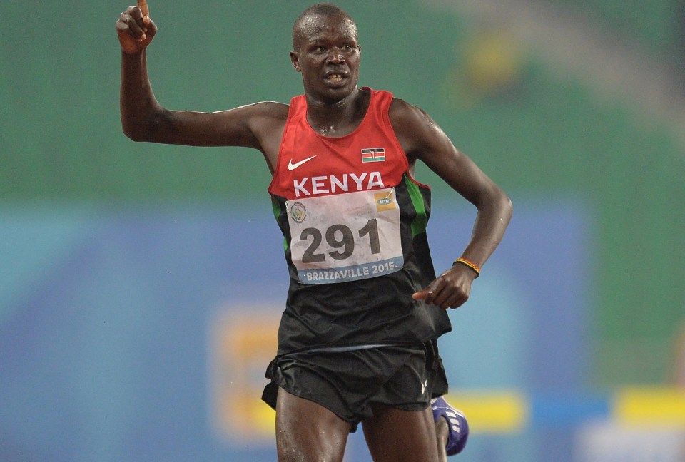 a runner wearing a kenya jersey with the number 291