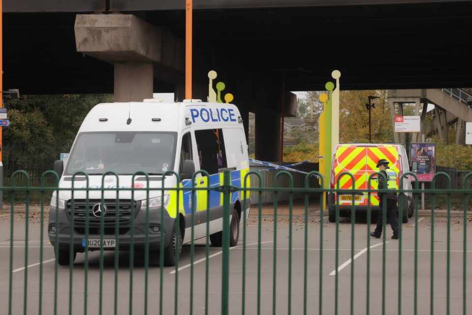 Police at Bescot Stadium railway station in Walsall, West Midlands