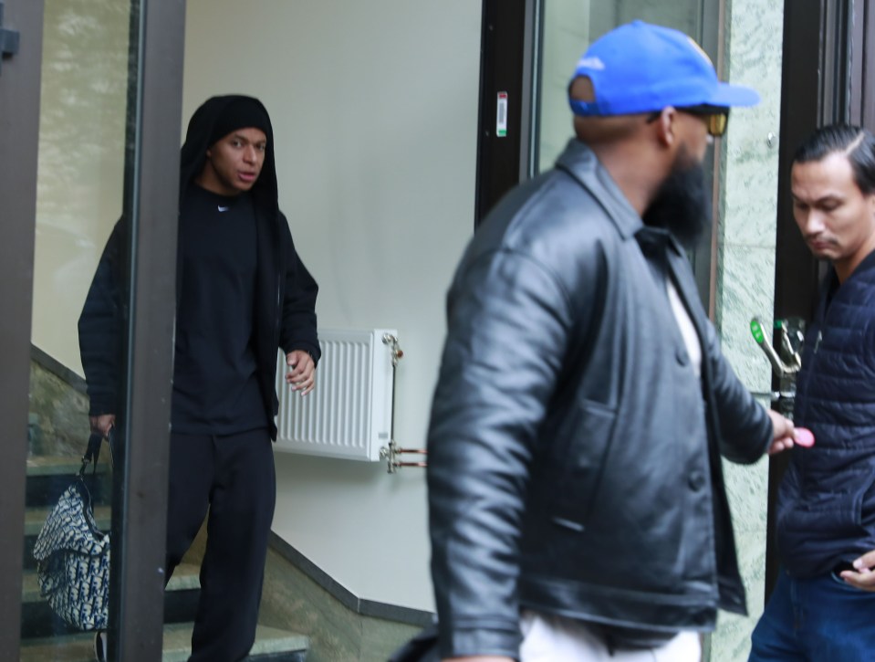 Mbappe was seen leaving the Bank Hotel on Friday before the complaint was filed