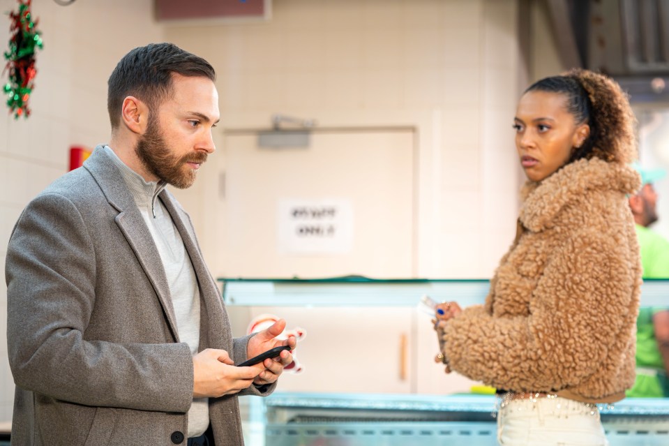 a man and a woman are standing in front of a sign that says private