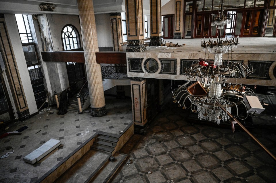 The interior of one of the abandoned properties with the crystal chandelier still handing from the ceiling