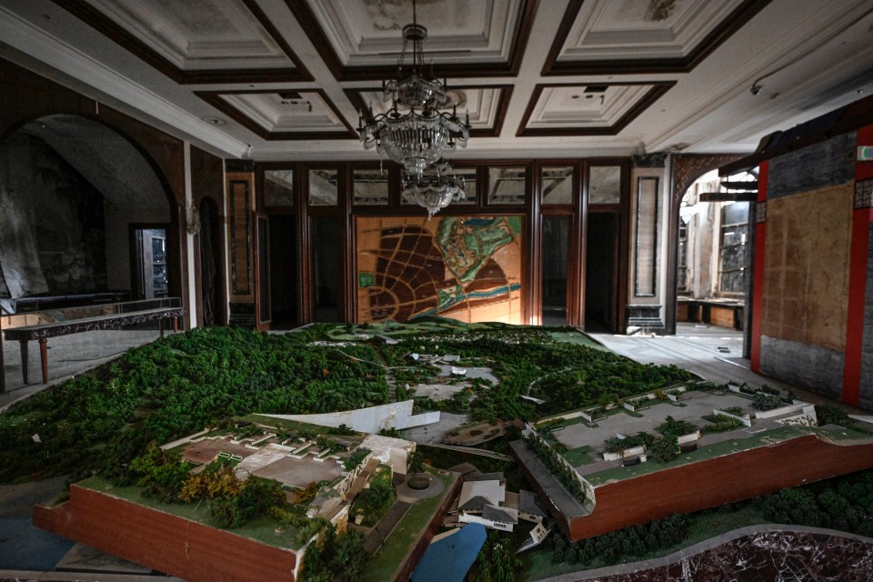 An interior image of the abandoned housing sales office on the Greenland development