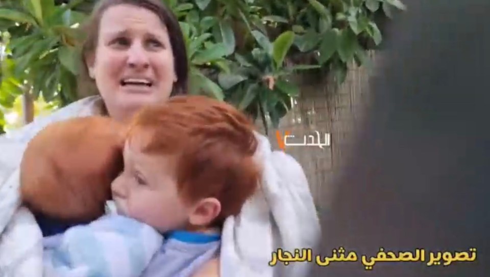 A terrified Shiri with baby Kfir in the Hamas video of their kidnapping