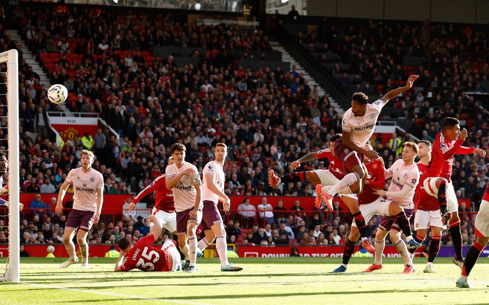 Ethan Pinnock nodded a controversial opener for Brentford