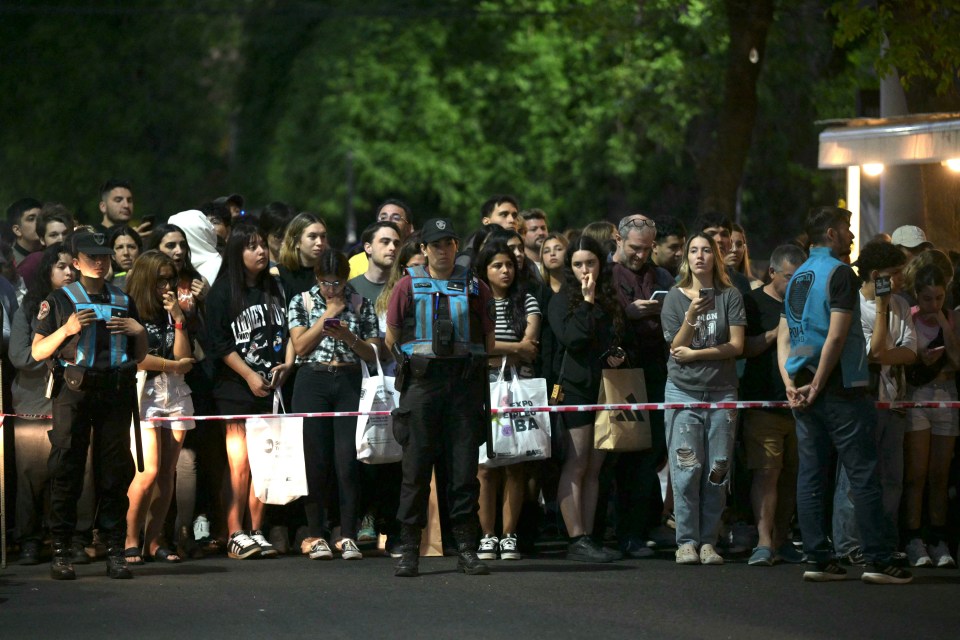 Crowds have gathered outside the hotel