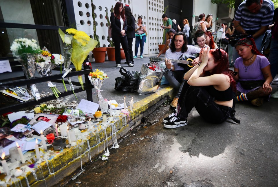 Fans pay tribute to the star outside the CasaSur Hotel