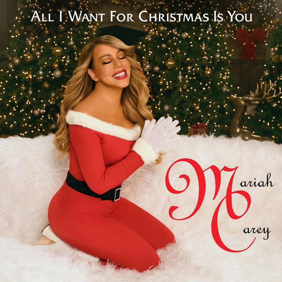 Mariah Carey slipped into a sexy Santa outfit again, 30 years on