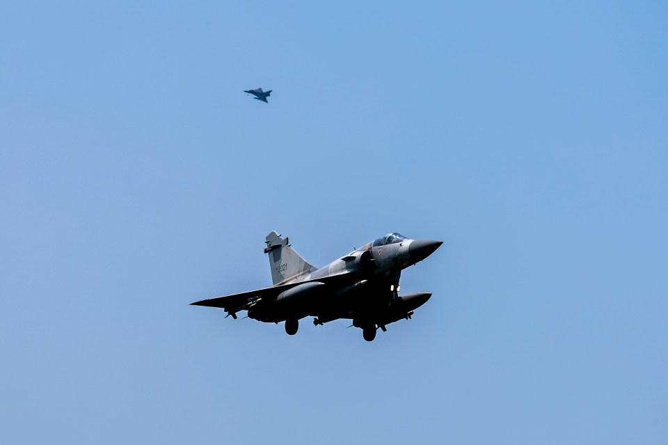 Two Taiwanese fighter jets armed with missiles take to the skies amid China’s latest war games