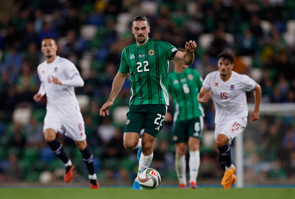 a soccer player with the number 22 on his jersey