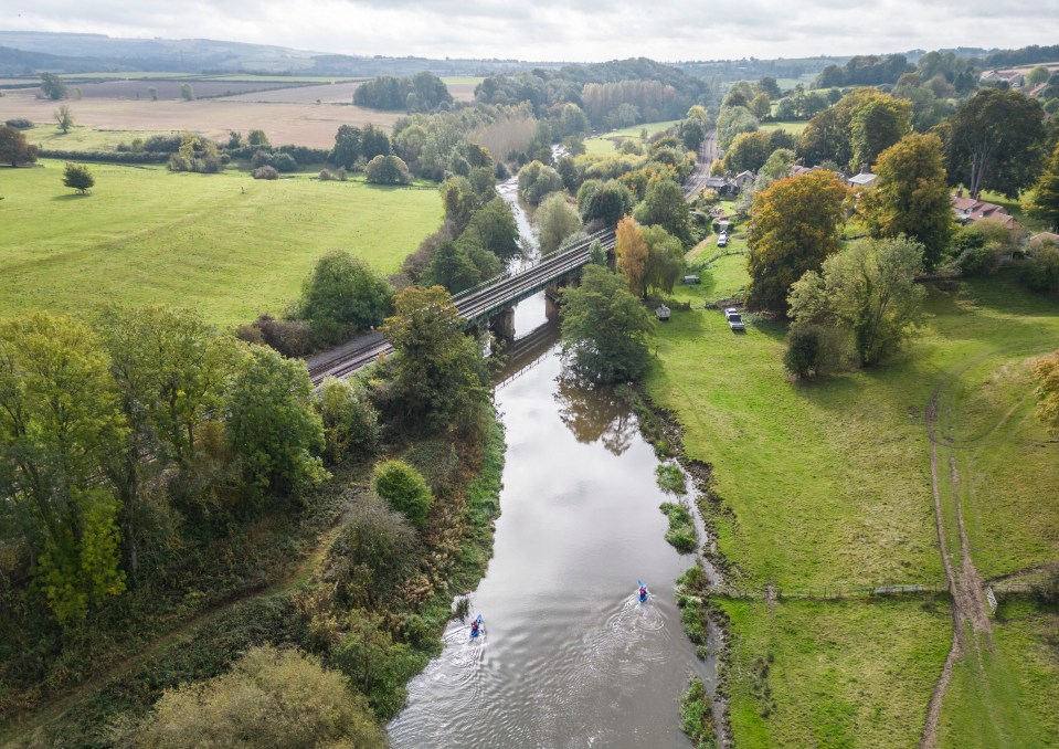 Cops scouring the river in canoes