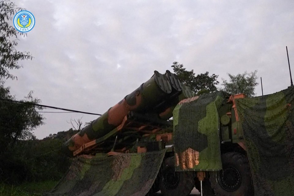 China's People’s Liberation Army footage shows Chinese missiles being deployed at an undisclosed location during the drills