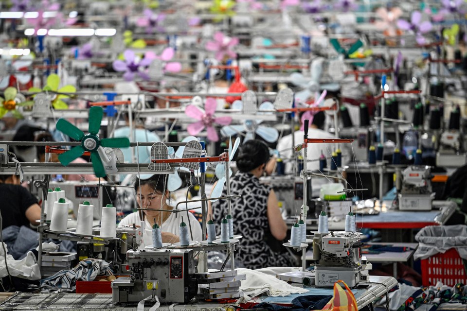 Workers producing garments at a factory that supplies clothes to Shein