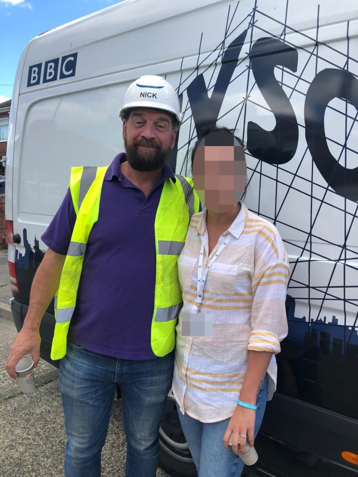 a man wearing a hard hat with the name nick on it