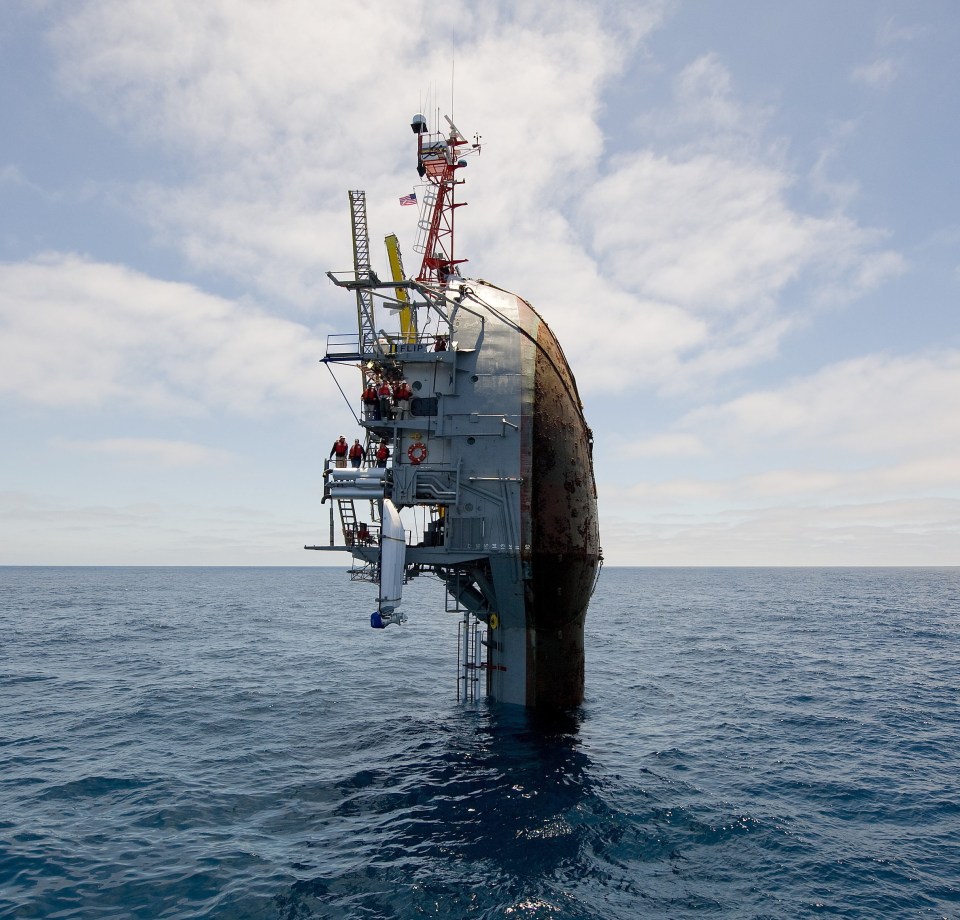 a large ship is in the middle of the ocean