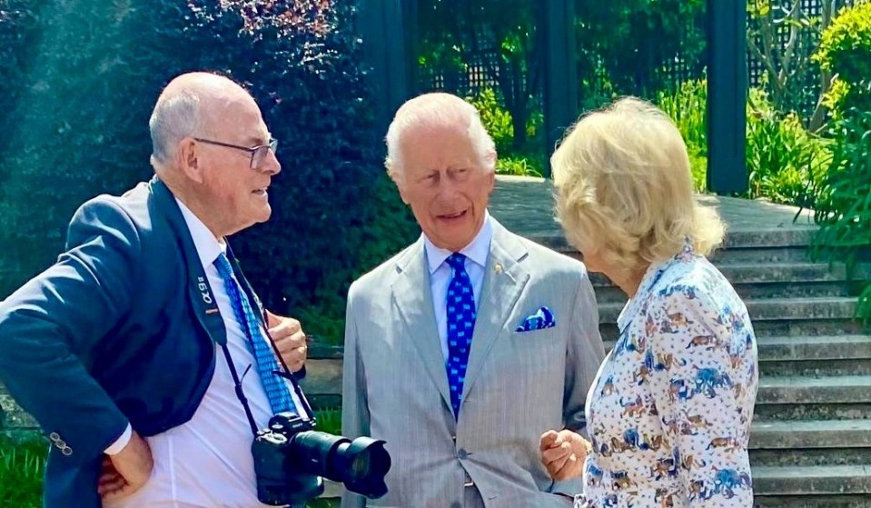 Arthur Edwards chatting to the King and Queen in the gardens of Admiralty House Sydney