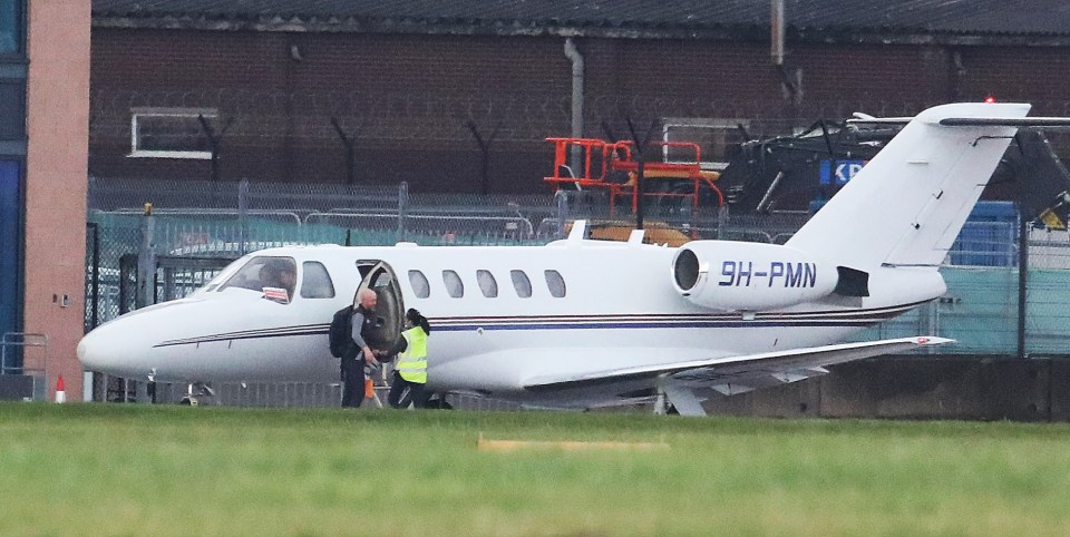 Erik ten Hag boards a private jet to Amsterdam just hours after being sacked as Man Utd's manager