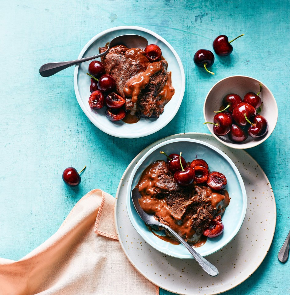 two bowls of chocolate ice cream with cherries on top