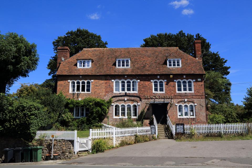 The Black Horse Pub was built in the 1470's as a dry-moated farmhouse for the Dering Family