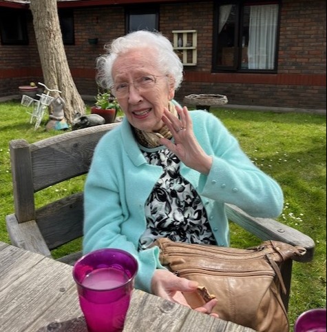 Rosemary Dovey, 89, is tearful as she tells The Sun that her neighbour died in the rubble, and how she dodged flares from enemy planes during a trip into the city