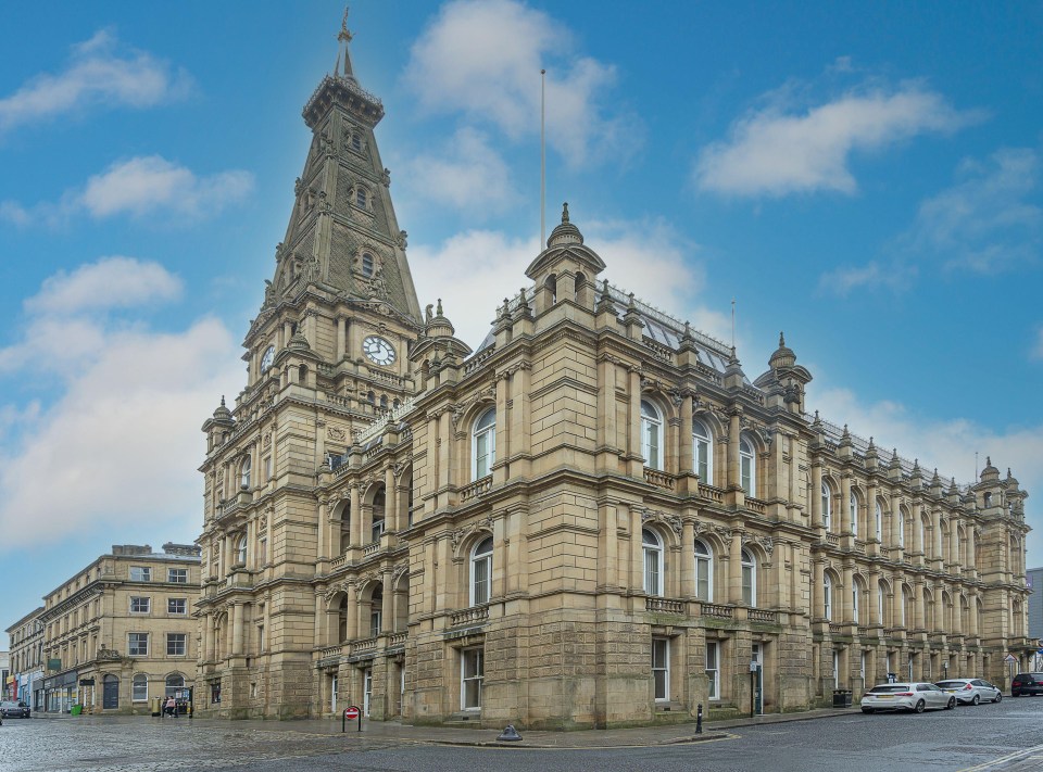 a large building with a clock on top of it