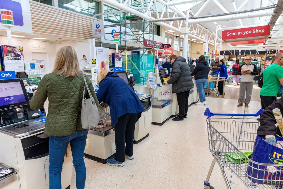 While lots of customers use the scanners, employees often have to conduct random checks on the trolleys