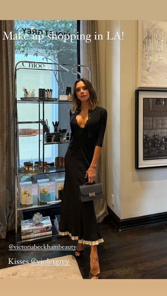 Victoria posed in a plunging black dress during a shopping trip in LA