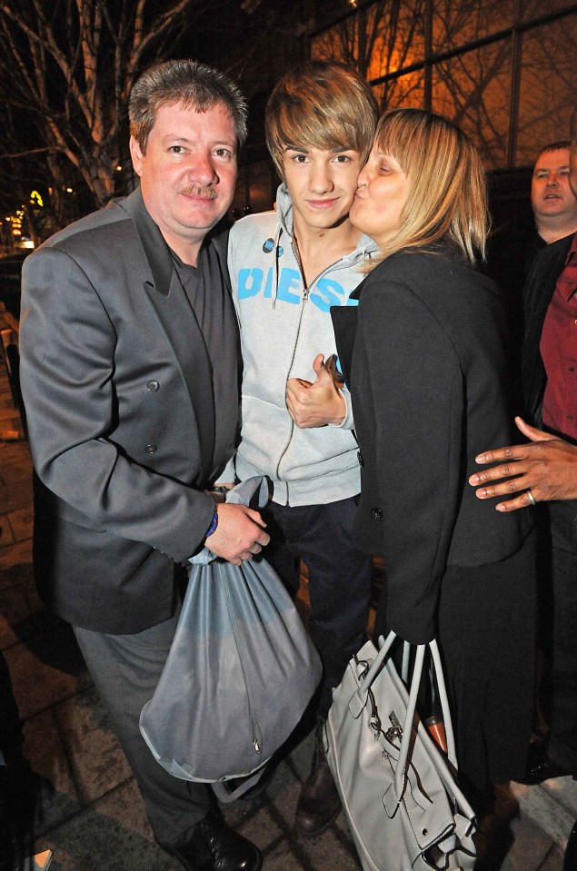 Liam with dad Geoff and mum Karen