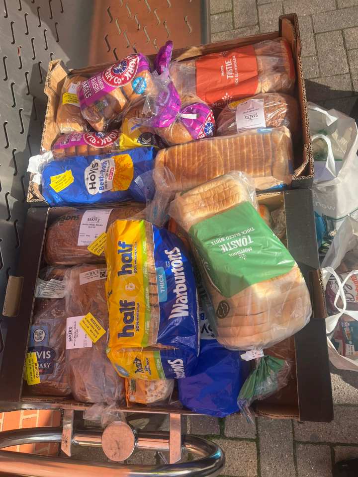 The crate of baked goods included several loaves of bread, packs of crumpets, bagels and buns