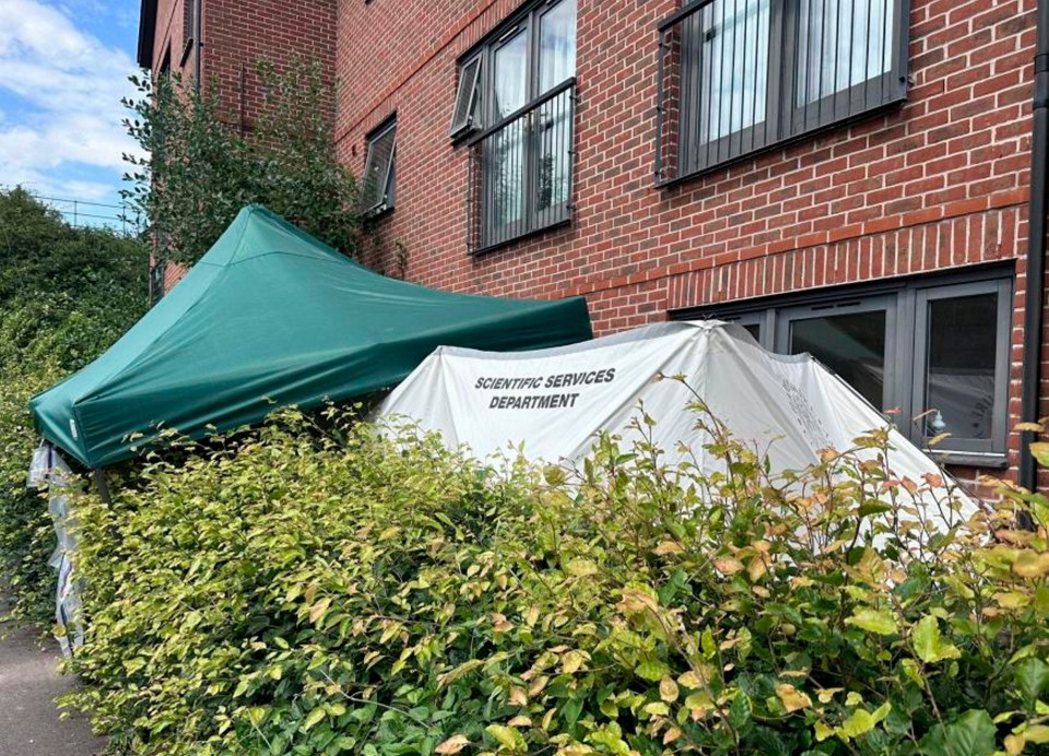 a white tent with scientific services department written on it