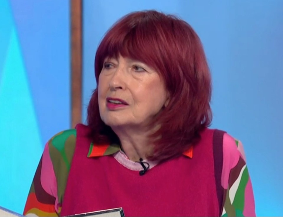 a woman with red hair is on loose women