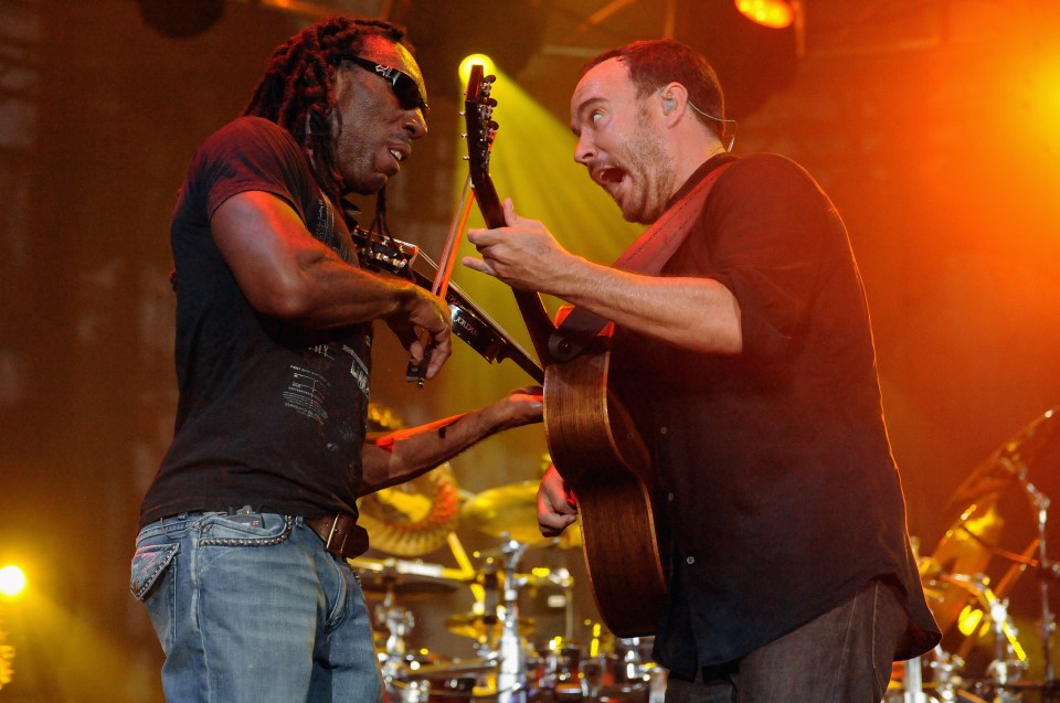 CHICAGO, IL - JULY 10:  Boyd Tinsley and Dave Matthews of Dave Matthews Band perform during the final day of Dave Matthews Band Caravan at Lakeside on July 10, 2011 in Chicago, Illinois.  (Photo by Jeff Kravitz/FilmMagic for Dave Matthews Band)