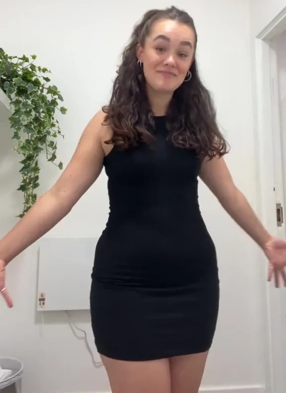 A woman has been slammed over her work outfits