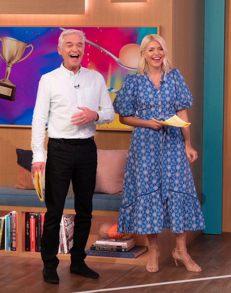 holly willoughby and phillip schofield are laughing together